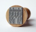 drewniany stempel z Bramą Floriańską